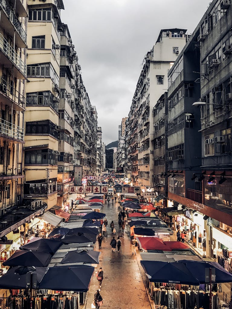Explore the bustling street market scene on Hong Kong Island, captured on a lively day.